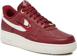 Czerwone buty sportowe Nike z płaską podeszwą sznurowane w sportowym stylu