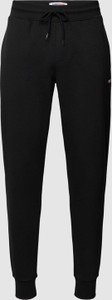Czarne spodnie Tommy Jeans z bawełny w sportowym stylu
