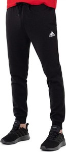 Czarne spodnie Adidas w sportowym stylu z tkaniny