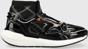 Czarne buty sportowe Adidas ultraboost z płaską podeszwą w sportowym stylu