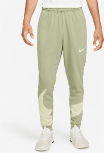 Zielone spodnie Nike z nadrukiem w sportowym stylu