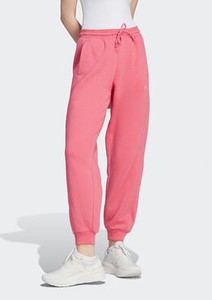 Różowe spodnie sportowe Adidas z dresówki w sportowym stylu