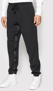 Czarne spodnie sportowe Adidas w sportowym stylu z dresówki