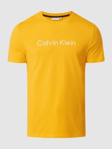 Żółty t-shirt Calvin Klein w młodzieżowym stylu z nadrukiem