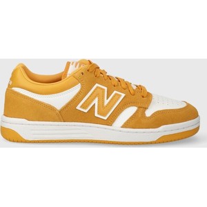 Żółte buty sportowe New Balance w sportowym stylu
