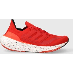 Czerwone buty sportowe Adidas Performance w sportowym stylu