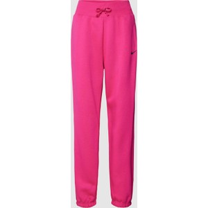 Różowe spodnie Nike z bawełny w sportowym stylu