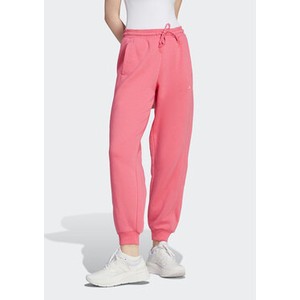 Różowe spodnie sportowe Adidas z dresówki w sportowym stylu