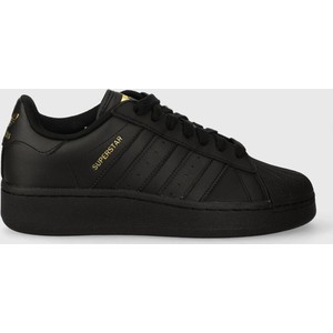 Czarne buty sportowe Adidas Originals z płaską podeszwą ze skóry w sportowym stylu