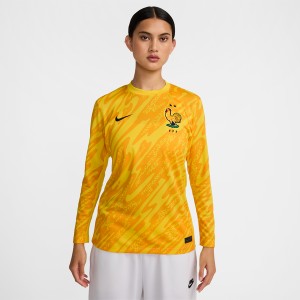 Żółta bluzka Nike z okrągłym dekoltem z długim rękawem