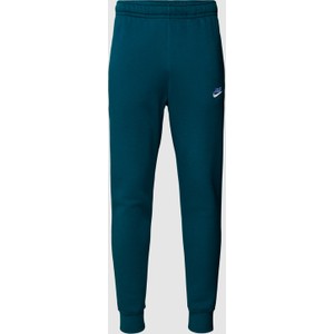 Zielone spodnie Nike z dresówki