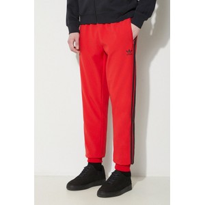 Czerwone spodnie Adidas Originals w sportowym stylu z dresówki