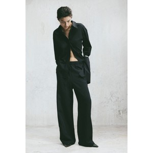 Czarne spodnie H & M w stylu retro z tkaniny