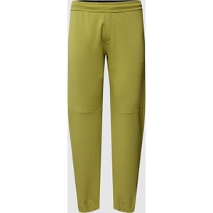 Zielone spodnie Calvin Klein w sportowym stylu