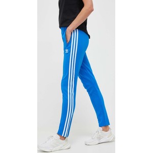 Niebieskie spodnie sportowe Adidas Originals w sportowym stylu