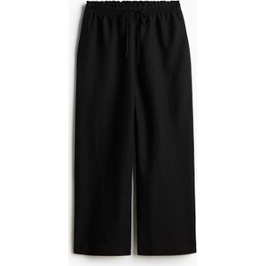 Czarne spodnie H & M w stylu retro