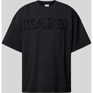 T-shirt Karl Kani z bawełny z nadrukiem w młodzieżowym stylu