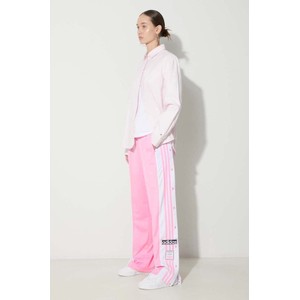 Różowe spodnie sportowe Adidas Originals w sportowym stylu