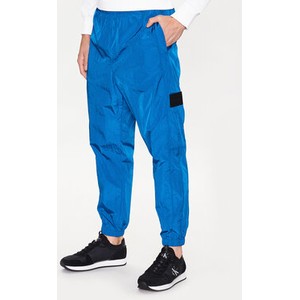 Niebieskie spodnie sportowe Calvin Klein z dresówki w sportowym stylu