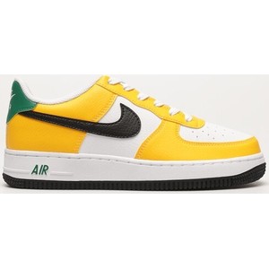 Żółte buty sportowe Nike sznurowane z płaską podeszwą