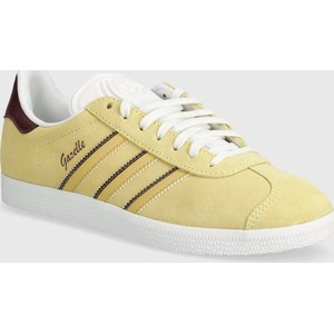 Żółte buty sportowe Adidas Originals w sportowym stylu sznurowane z płaską podeszwą