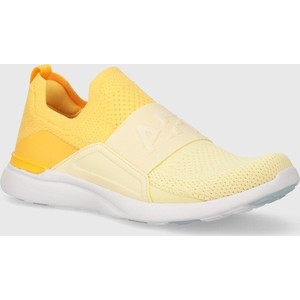 Żółte buty sportowe Apl Athletic Propulsion Labs w sportowym stylu