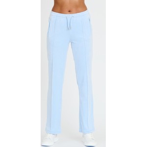 Niebieskie spodnie sportowe Juicy Couture z dresówki