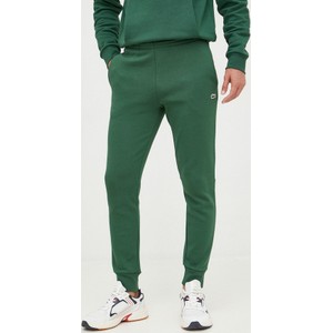 Zielone spodnie Lacoste w sportowym stylu