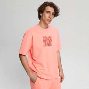 Różowy t-shirt Sinsay z nadrukiem