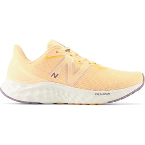 Żółte buty sportowe New Balance z płaską podeszwą w sportowym stylu
