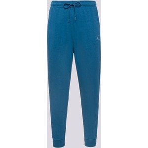 Niebieskie spodnie Jordan w street stylu