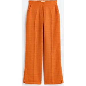 Pomarańczowe spodnie H & M z tkaniny