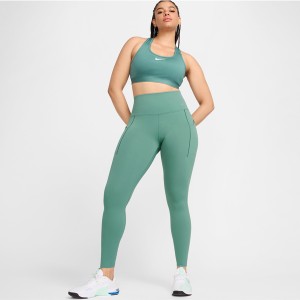 Zielone spodnie Nike w sportowym stylu