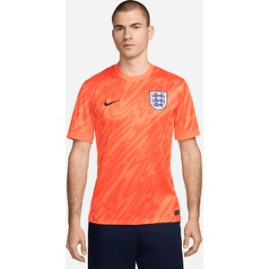 Pomarańczowy t-shirt Nike w sportowym stylu