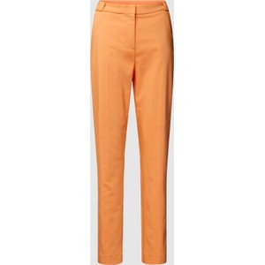 Pomarańczowe spodnie comma,