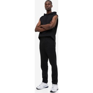 Czarne spodnie H & M w sportowym stylu