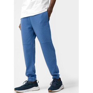 Niebieskie spodnie 4F w sportowym stylu