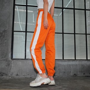 Pomarańczowe spodnie sportowe Maybella z dresówki