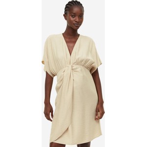 H & M & - MAMA Drapowana sukienka - Beżowy