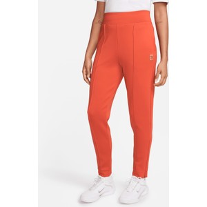 Pomarańczowe spodnie Nike w stylu klasycznym