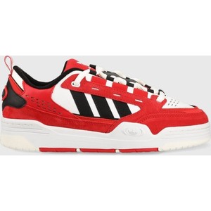 Czerwone buty sportowe Adidas Originals sznurowane w sportowym stylu
