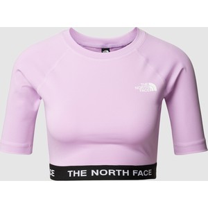 Różowy t-shirt The North Face w sportowym stylu z okrągłym dekoltem