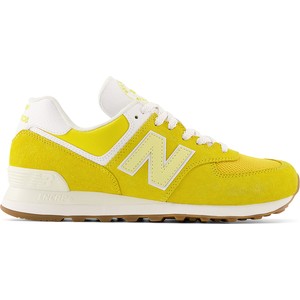 Żółte buty sportowe New Balance w sportowym stylu