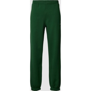 Zielone spodnie Lacoste z dresówki