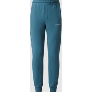 Niebieskie spodnie Calvin Klein w sportowym stylu