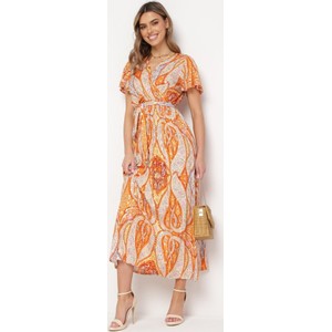 Pomarańczowa sukienka born2be kopertowa maxi z dekoltem w kształcie litery v