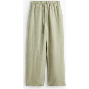 Zielone spodnie H & M z tkaniny