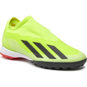 Żółte buty sportowe Adidas ultraboost w sportowym stylu