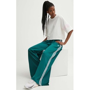 Zielone spodnie sportowe Adidas Originals z dresówki
