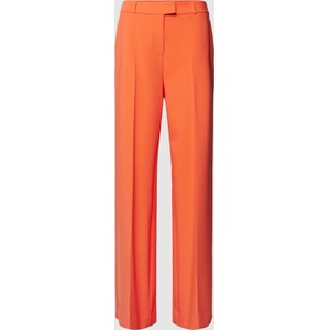 Pomarańczowe spodnie comma,